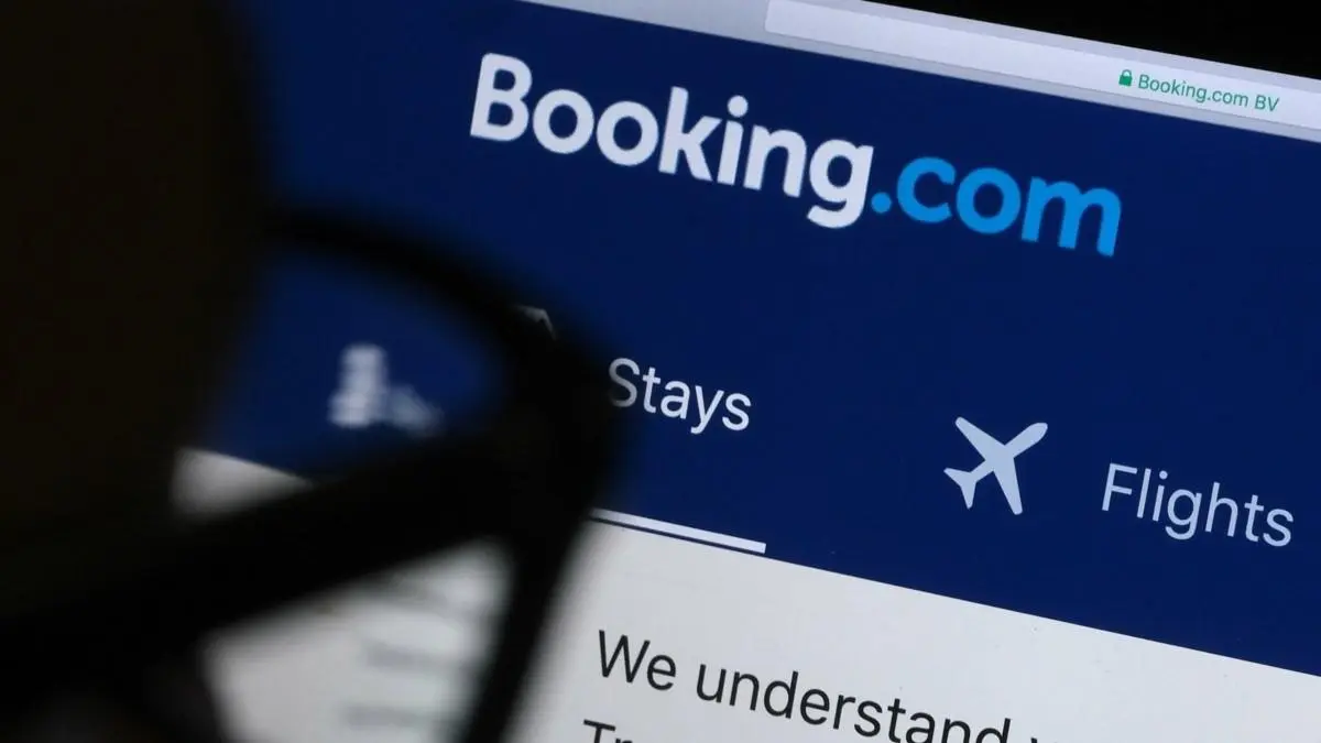 booking criptomonedas - Cómo cobra Booking en Argentina